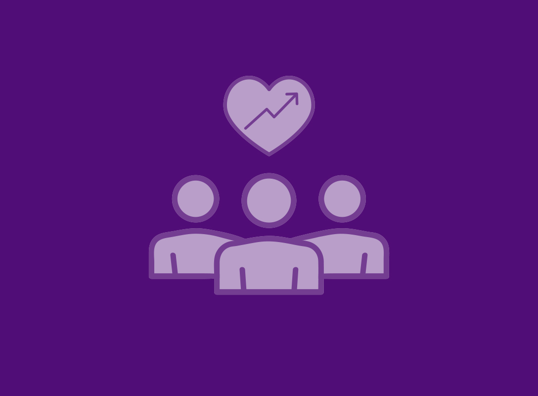 3 people with a heart above