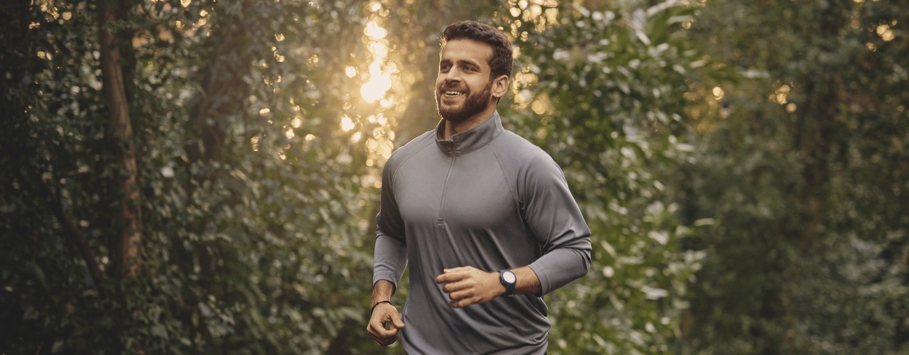 Man running in a forest